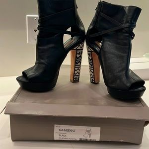 BCBG black tribal heels